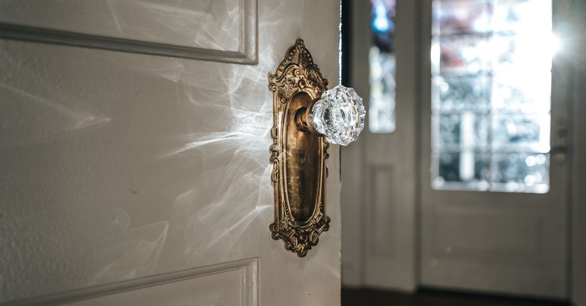 locksmith hands door — Bradenton Locksmith Pro